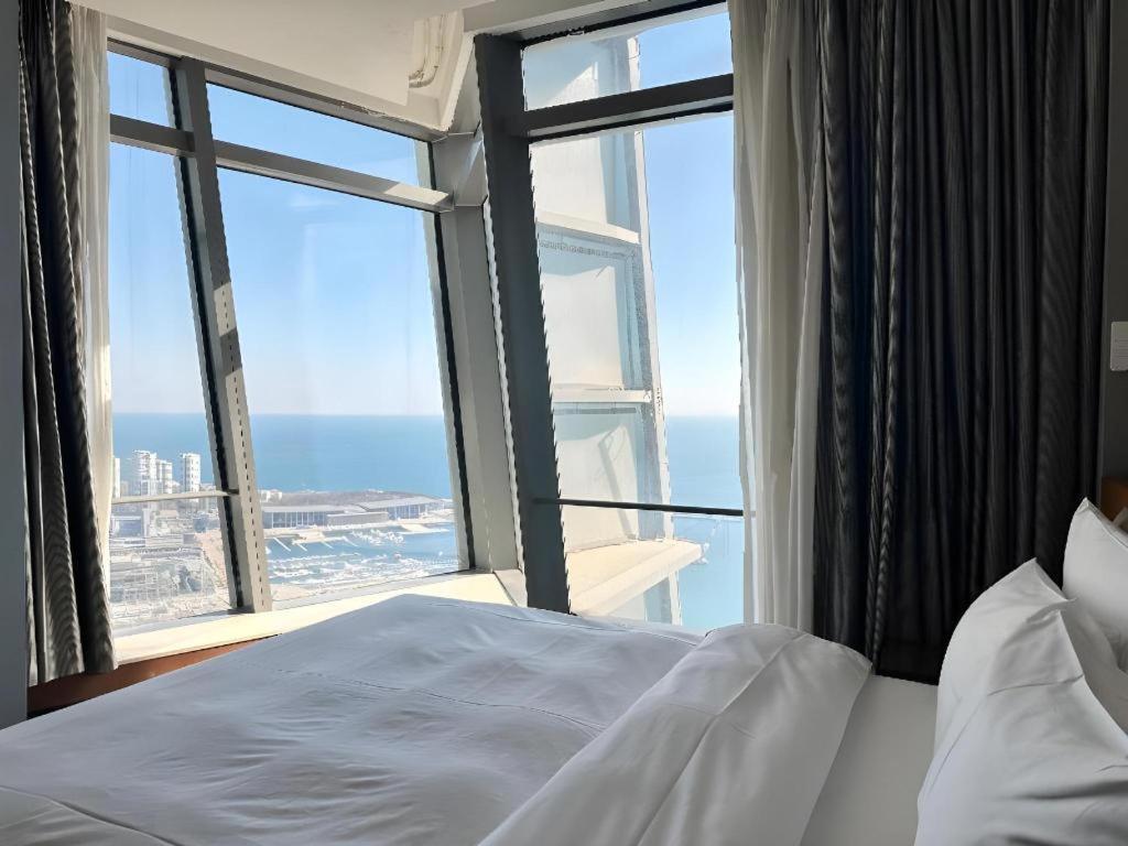 Grand Madison Qingdao Harbour-View Central（Former Qingdao Farglory Hotel） Buitenkant foto